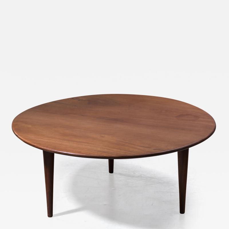 Round Scandinavian Modern walnut coffee table