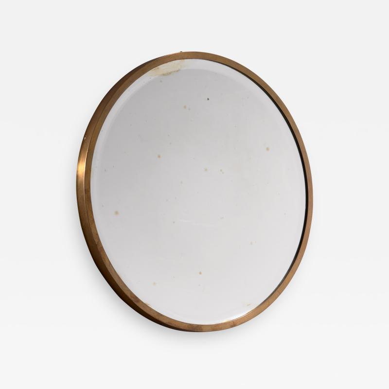 Round brass wall mirror