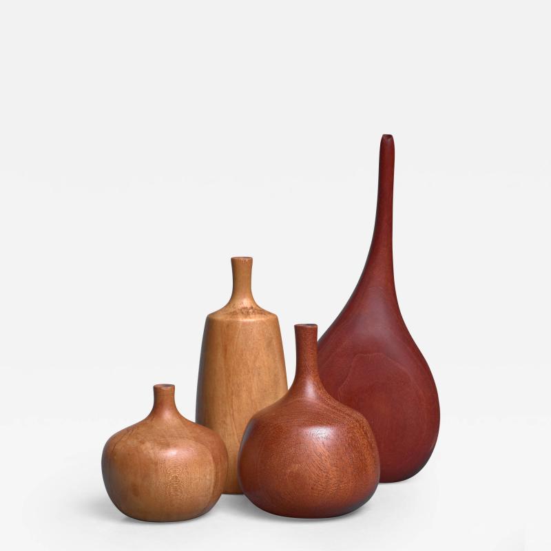 Rude Osolnik Set of four turned wood vases three by Rude Osolnik USA 1960s