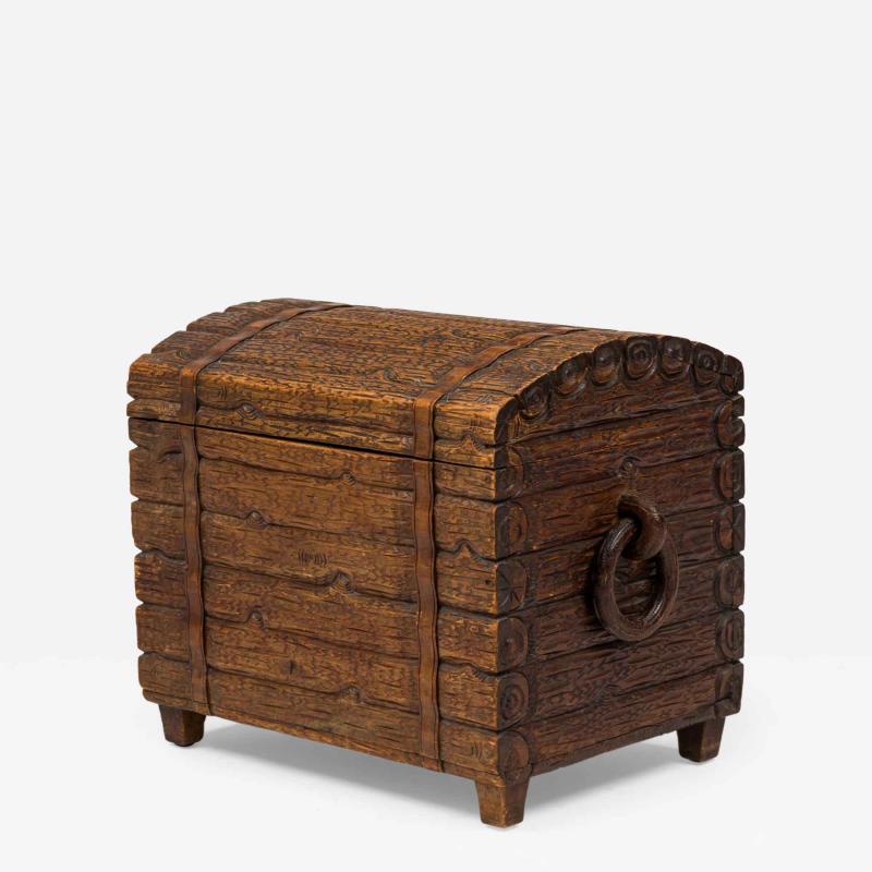 Rustic Black Forest Wood Trunk with Hand Carved Exterior and Ring Handles