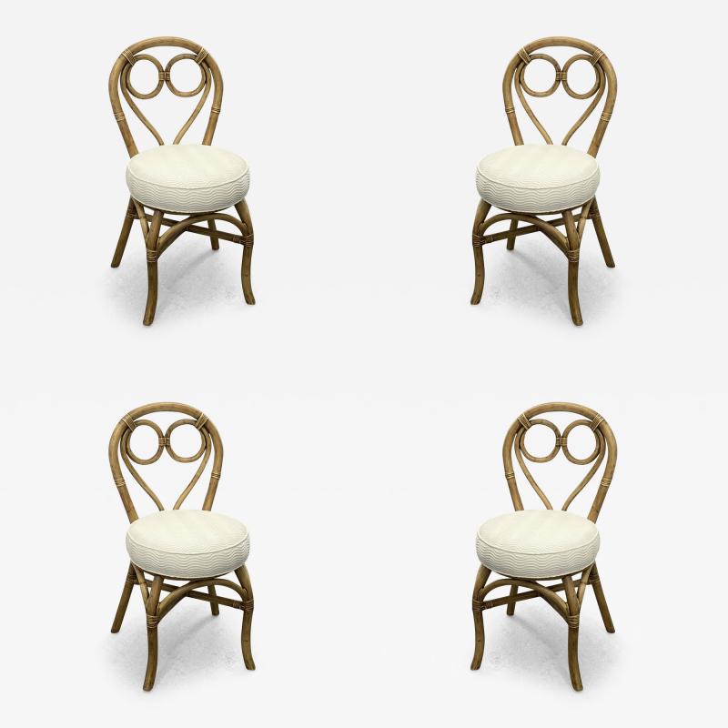 SET OF FOUR VINTAGE RATTAN CHAIRS