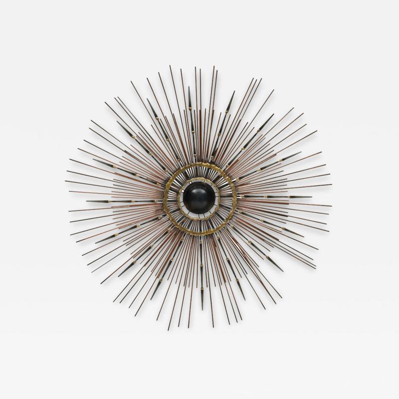 STEEL AND BRASS WELDED SUNBURST MIRROR