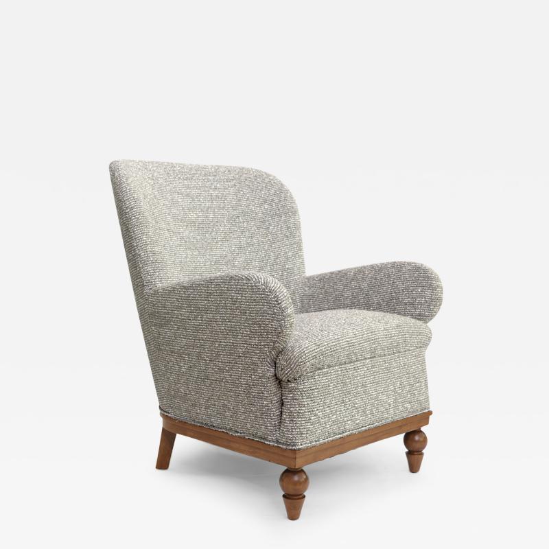 SWEDISH ART DECO LOUNGE CHAIR WITH CARVED MAHOGANY BASE
