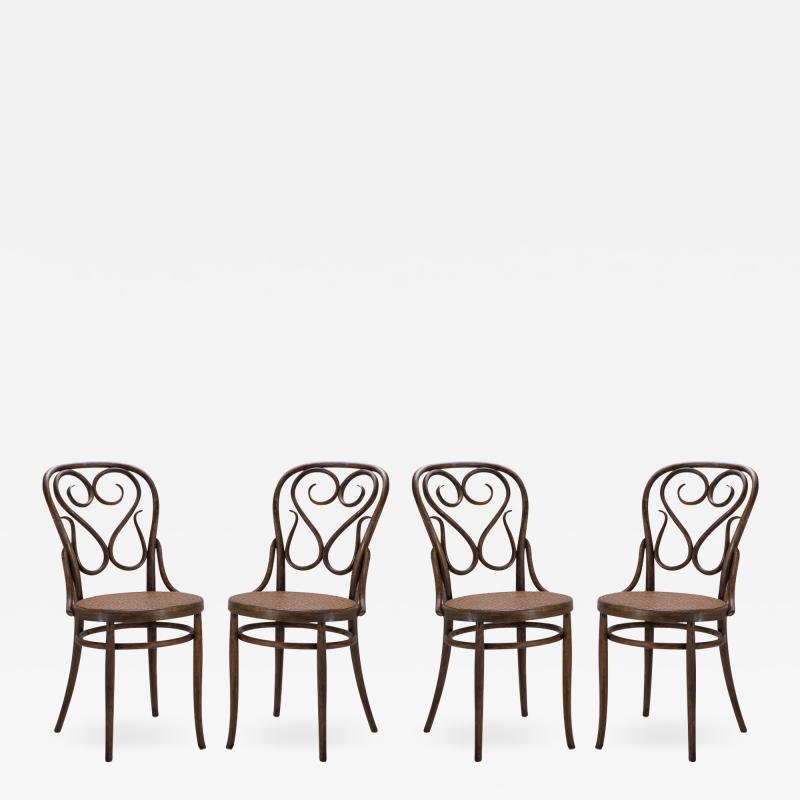 Salvatore Leone Bentwood Dining Side Chairs with Caned Seats by Salvatore Leone Set of Four