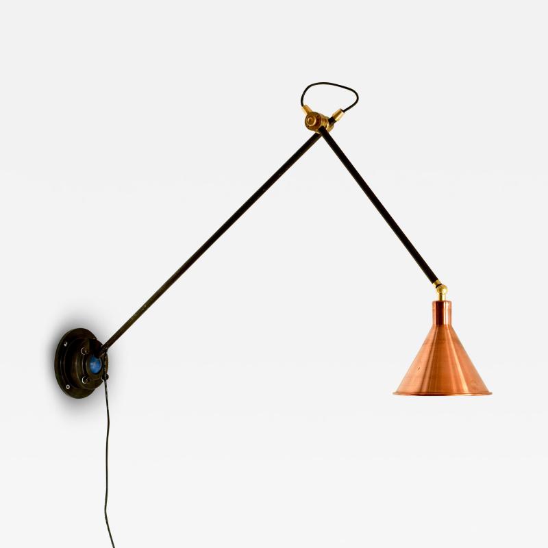 Sang Pil Bae Articulating wall lamp with copper shade