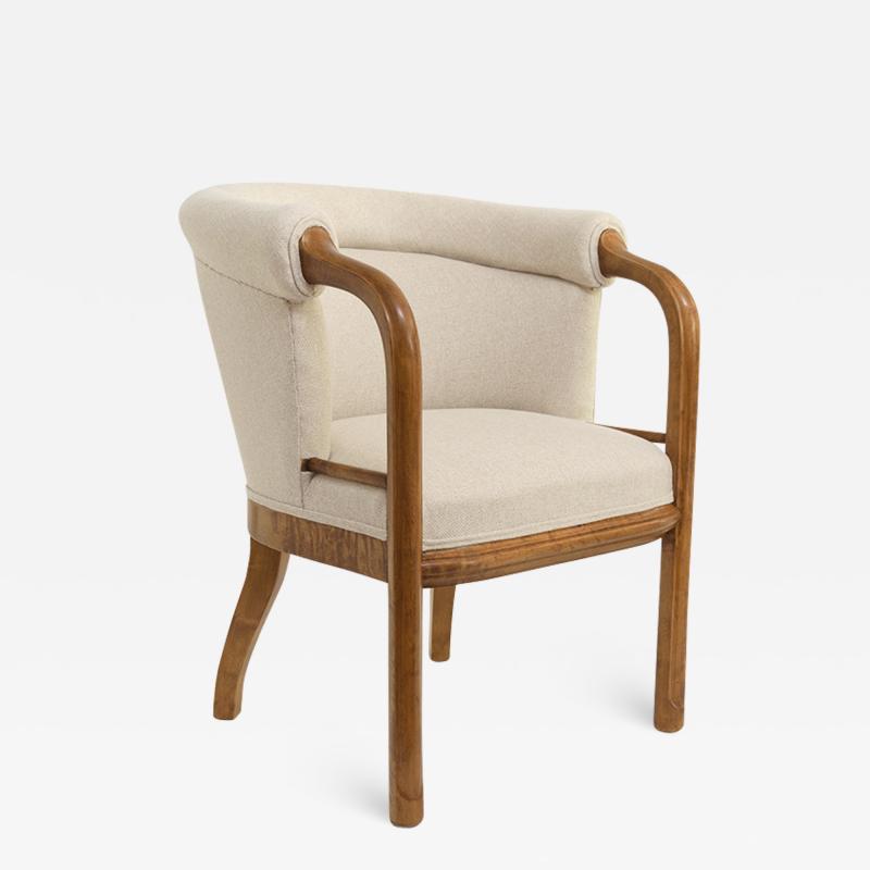 Scandinavian Modern Art Deco armchair in solid stained birch with carved frame 