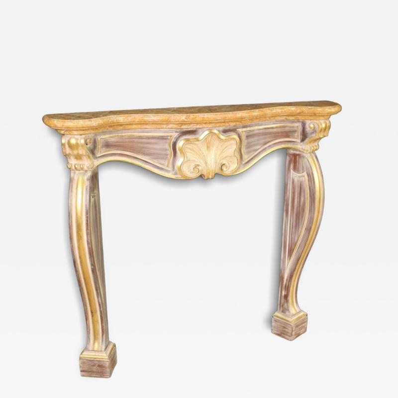 Scenic Italian painted and gilded wooden fireplace