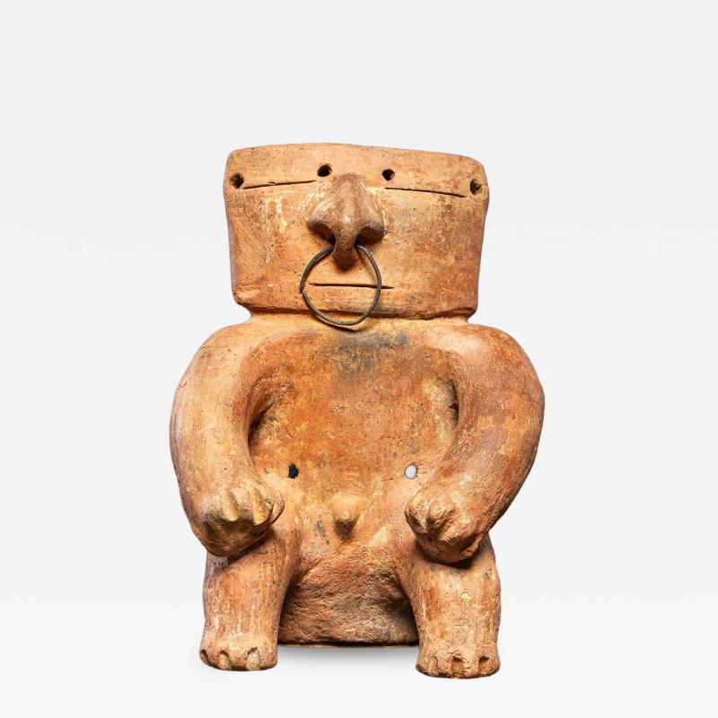 Seated terracotta Figure with nose ring Quimbaya culture ca 100 AD