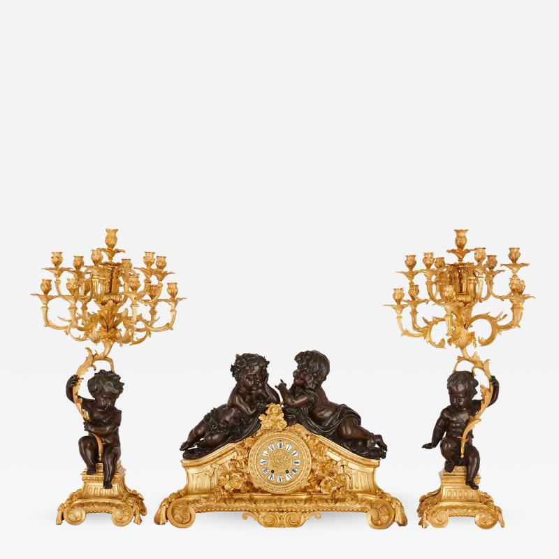 Second Empire period patinated and gilt bronze three piece clock set