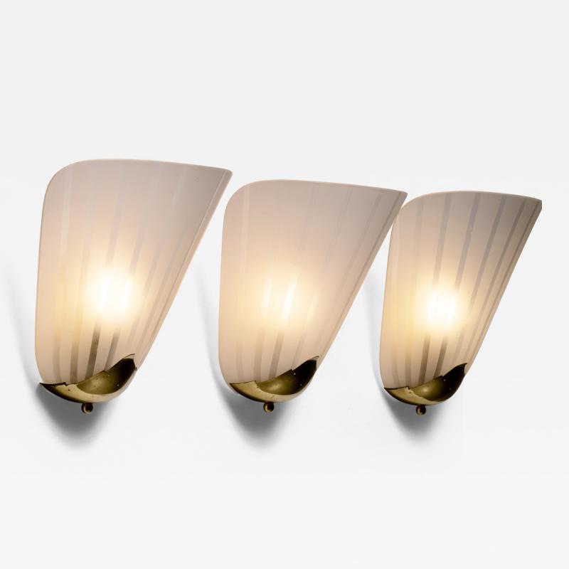 Set of 3 brass and glass wall lamps