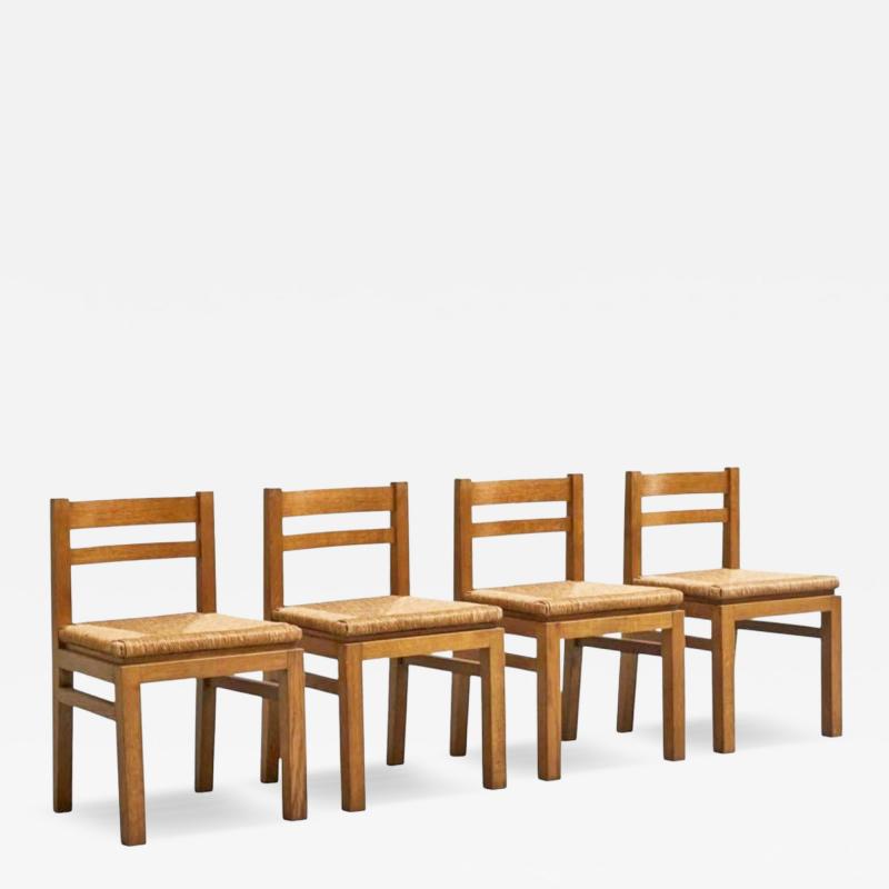 Set of 4 Modernist Chairs in Solid Oak and Straw Belgium 1960s