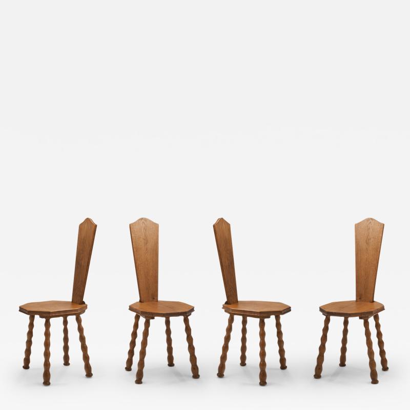 Set of 4 Sculptural Patinated Oak Spinning Chairs Europe ca early 20th century