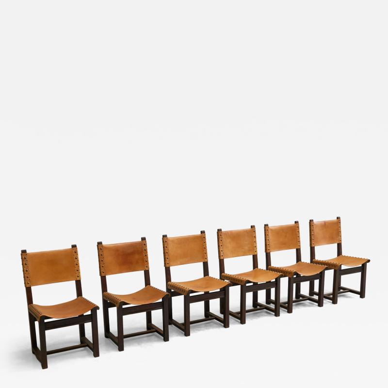Set of 6 Mid Century Spanish Style Chairs in Patinated Cognac Leather and Studs