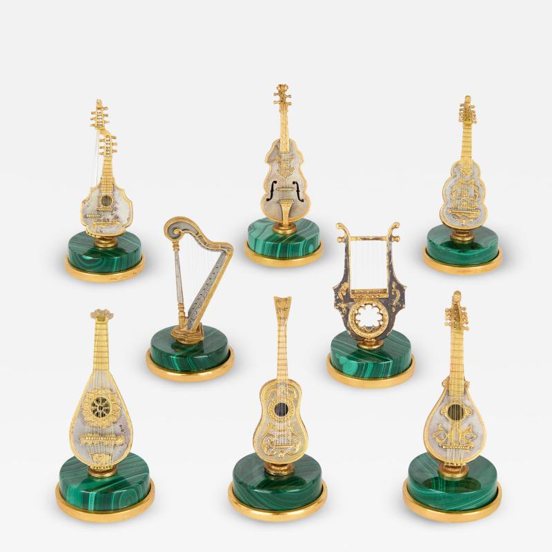 Set of 8 Italian silver silver gilt and malachite musical instrument models