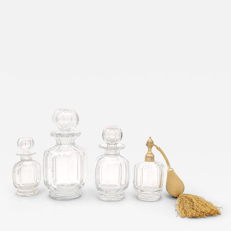 Set of Four Baccarat Dresser Bottles