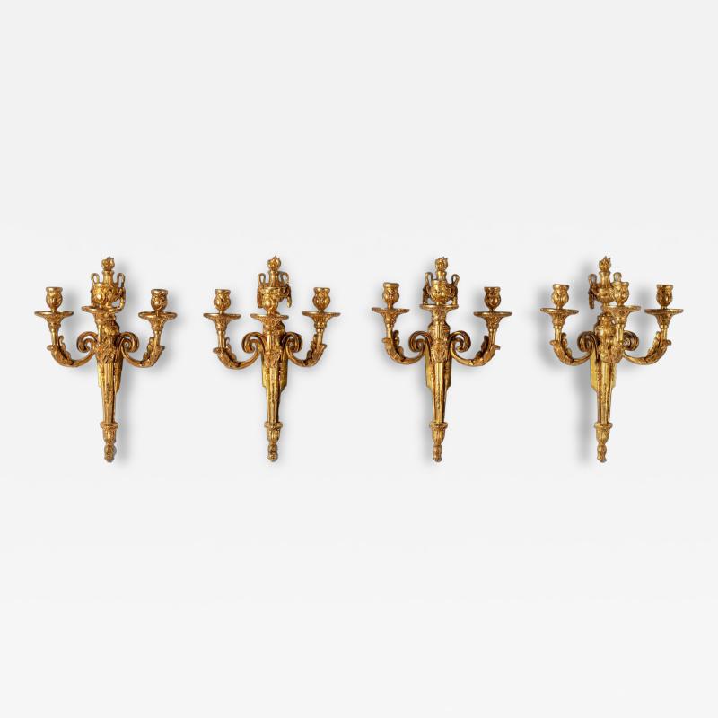 Set of Four Louis XV Ormolu Three Branch Wall Lights Circa 1770
