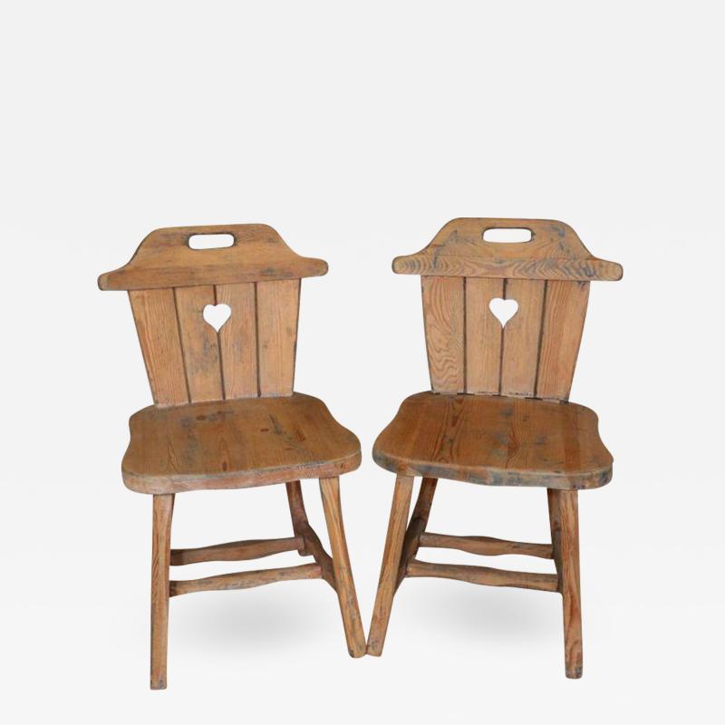 Set of Four Rustic Charming Hand Carved Alpine Chairs