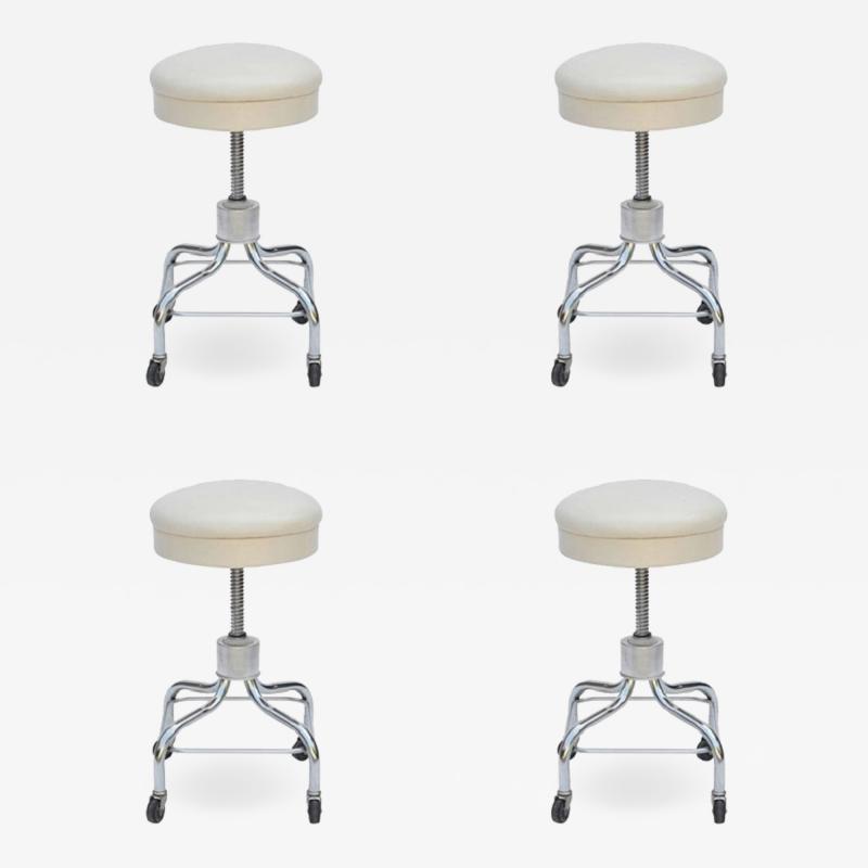 Set of Four Vintage Chrome and White Leather Adjustable Rolling Stools