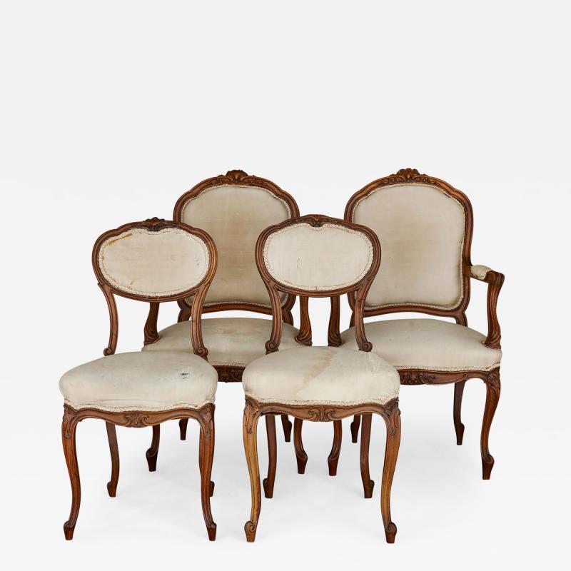 Set of R gence style mahogany armchairs and side chairs