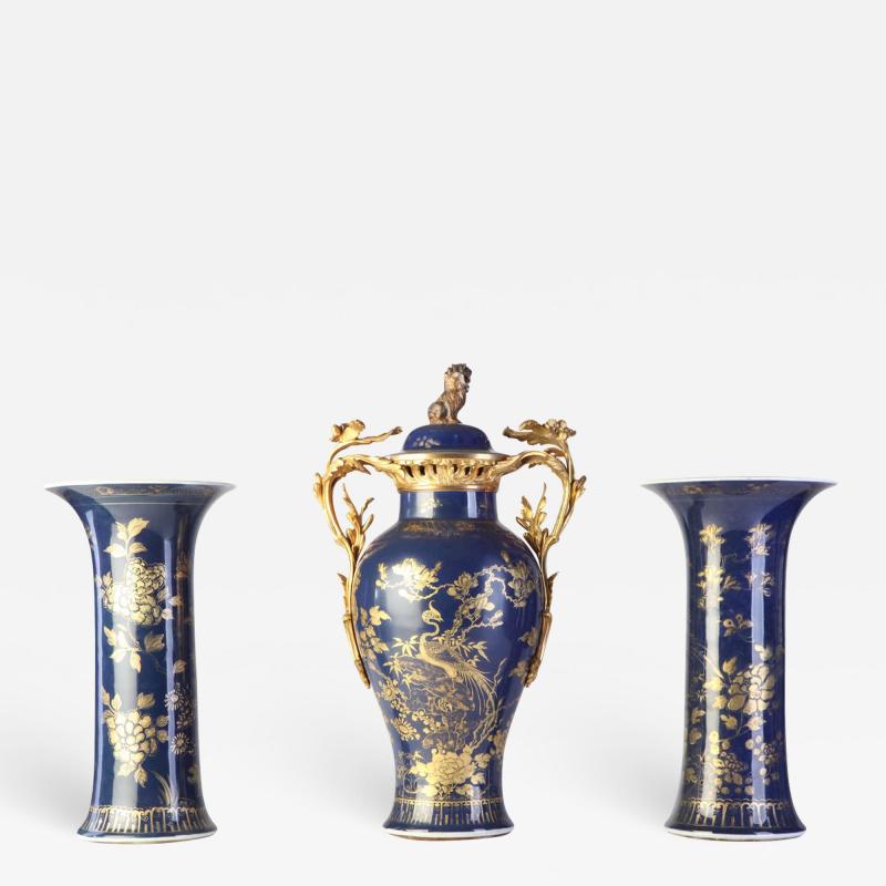 Set of Three Chinese Powder Blue Gilt Decorated Vases