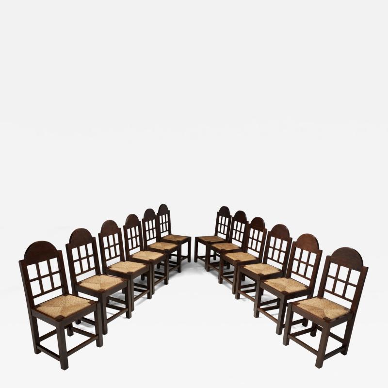 Set of Twelve Oak and Straw Dining Chairs with Geometric Backs Spain ca 1930s