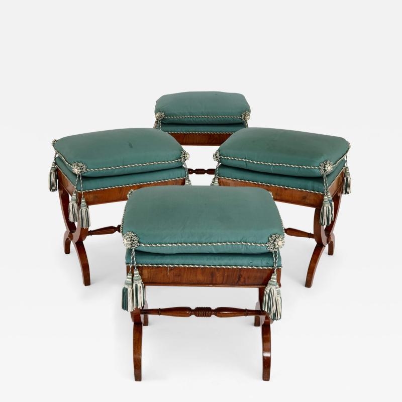 Set of four 19th century upholstered walnut X frame stools