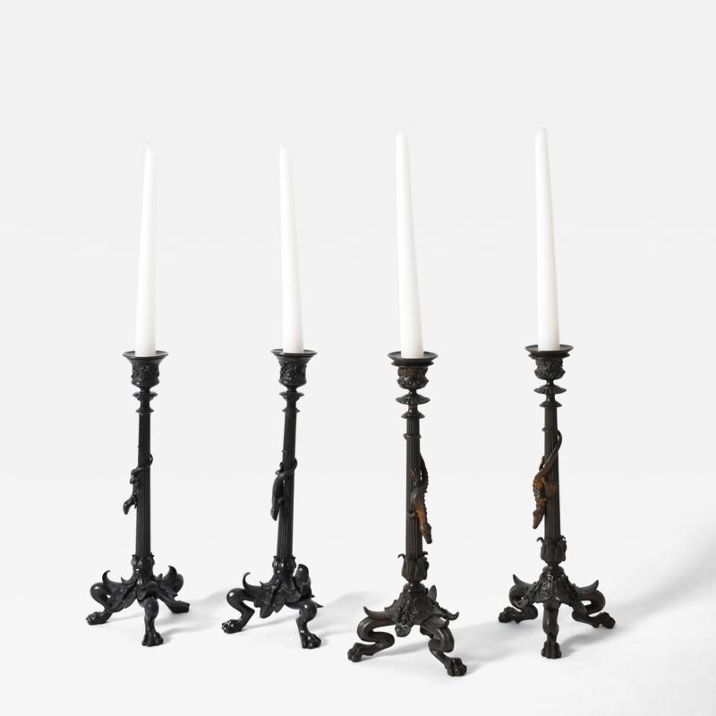 Set of four tripod zoomorphic bronze candleholders XIXth c 