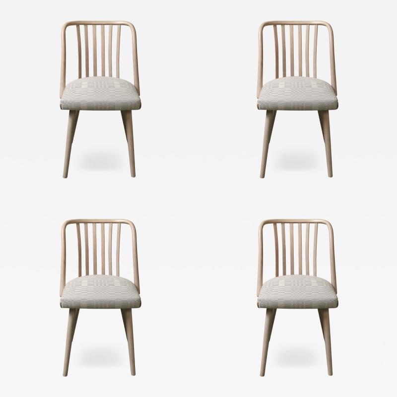 Set of four whitewashed Thonet chairs