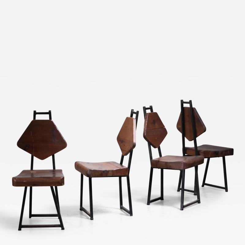 Set of four wood and iron chairs