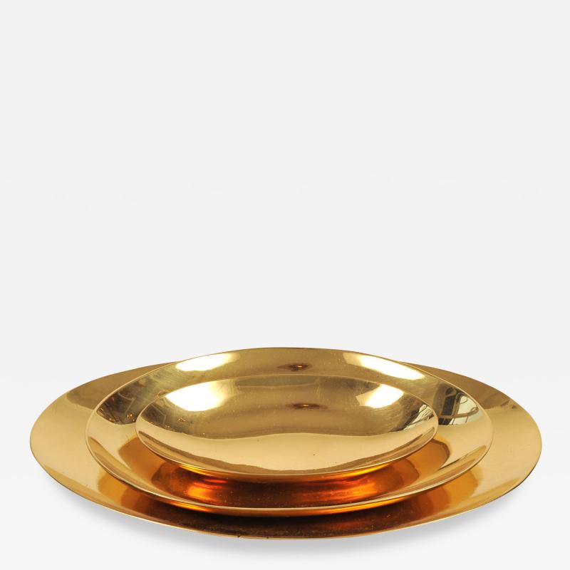 Set of three handmade cast brass trays