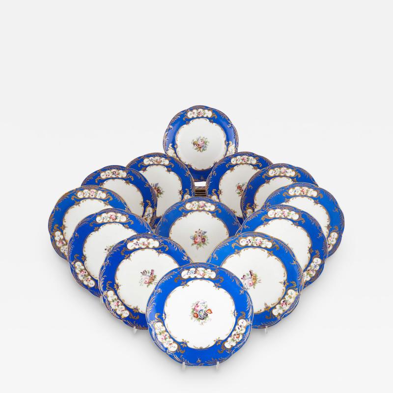 Set of twenty four blue and white floral porcelain dinner plates