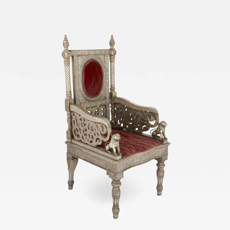 Silvered metal and red velvet throne chair