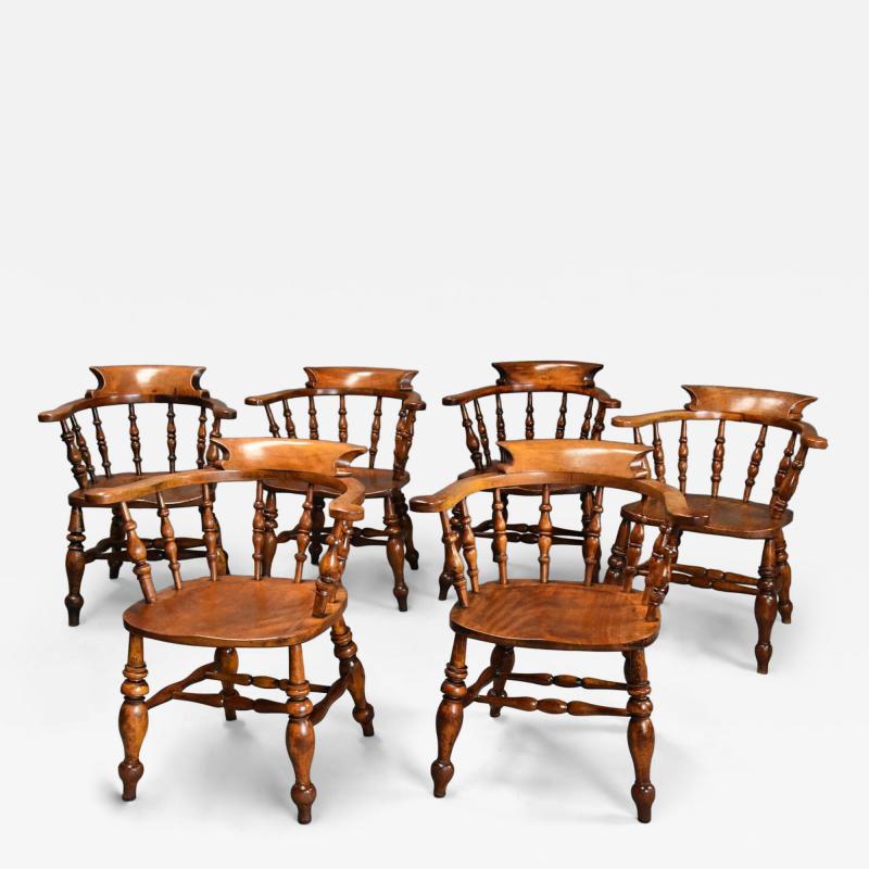 Six mid 19th century smokers bow Windsor or Captain s chairs