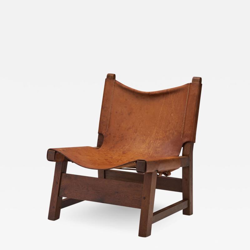 Small Wood and Leather Chair by a European Cabinetmaker Europe ca 1950s