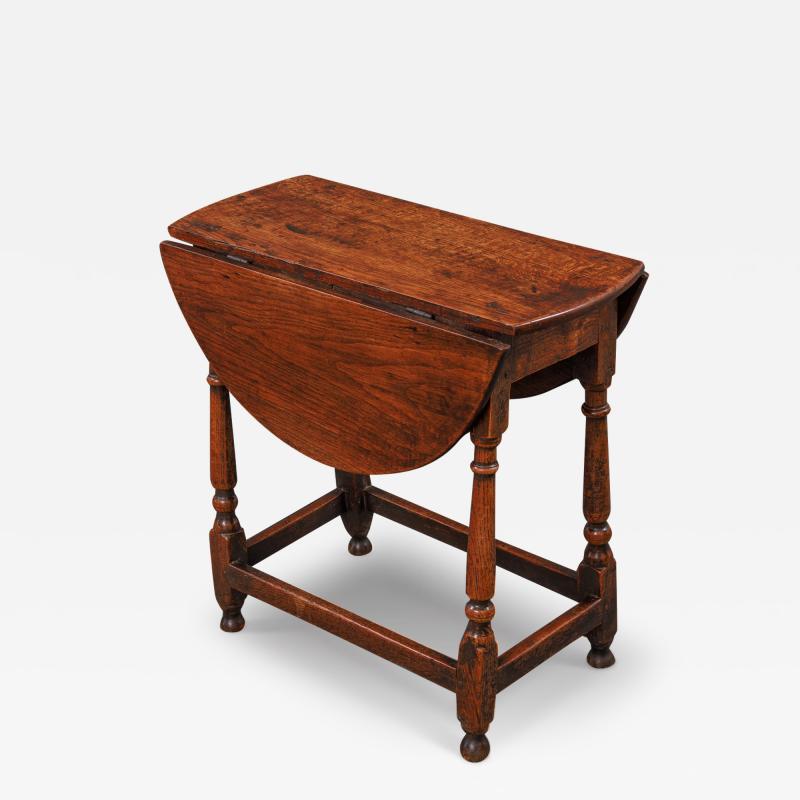 Small and Interesting 18th Century Oak Drop Leaf Table