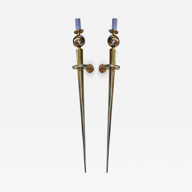 Spade shaped pair of awesome solid bronze sconces