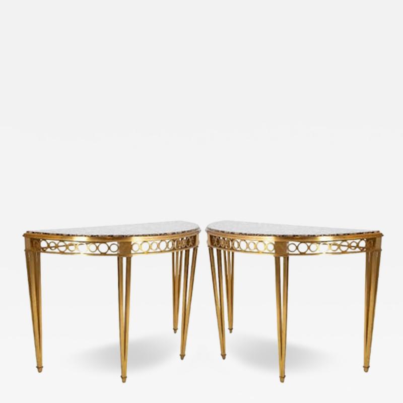 Striking Pair of Bronze Consoles with Fossilized Marble Tops