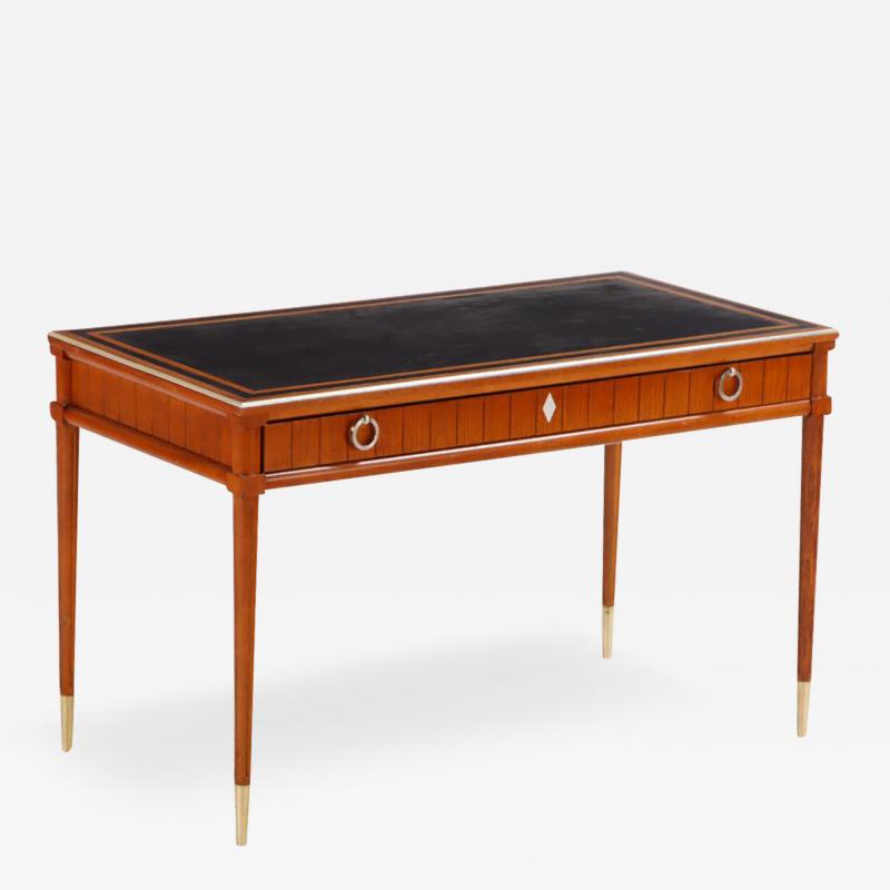 Stylish walnut lwriting desk in the manner of Jean Michel Frank C 1960