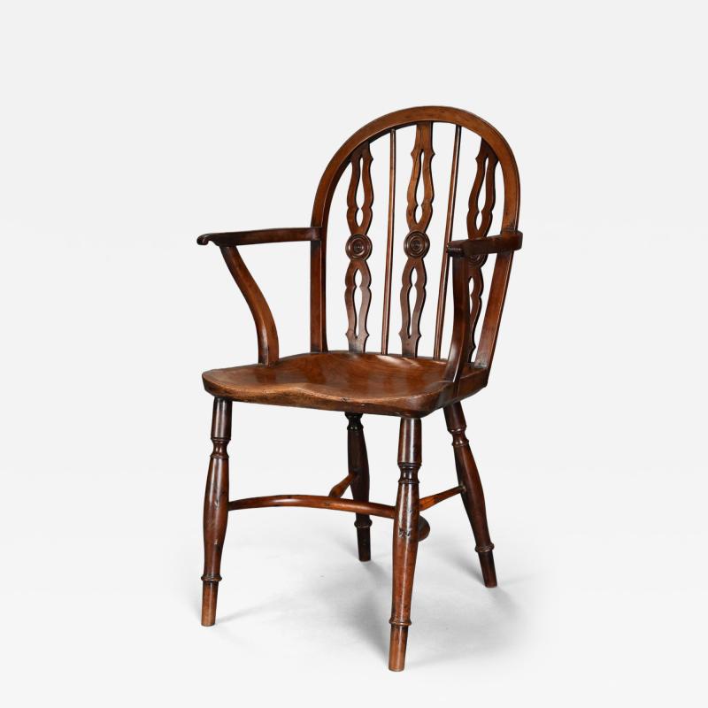 Superb 19th century yew wood Prior low hoop back Windsor armchair