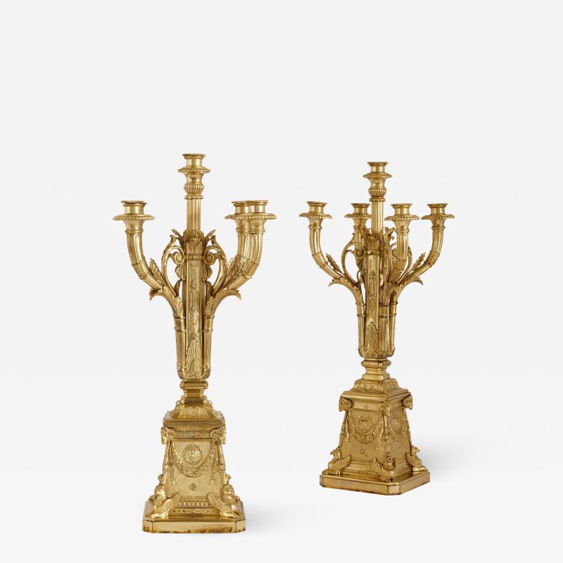 Susse Freres Pair of Neoclassical style gilt bronze candelabra by Susse Fr res