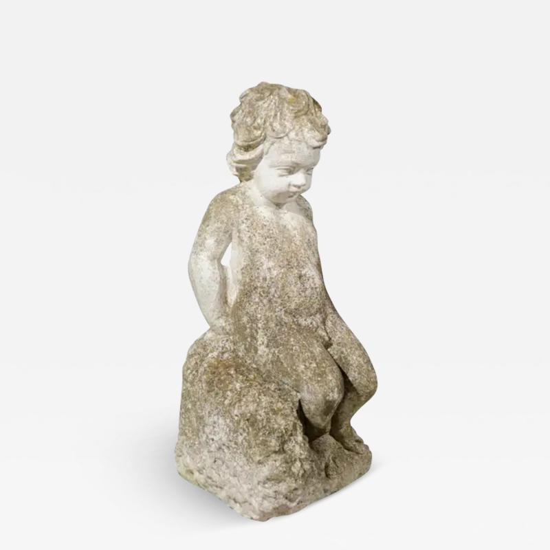 Swedish Carved Stone Garden Sculpture of a Putto Sitting on a Rock 20th Century