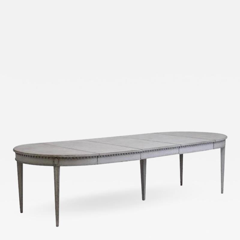 Swedish Gustavian Style Three Leaf Extension Dining Table With Carved Apron