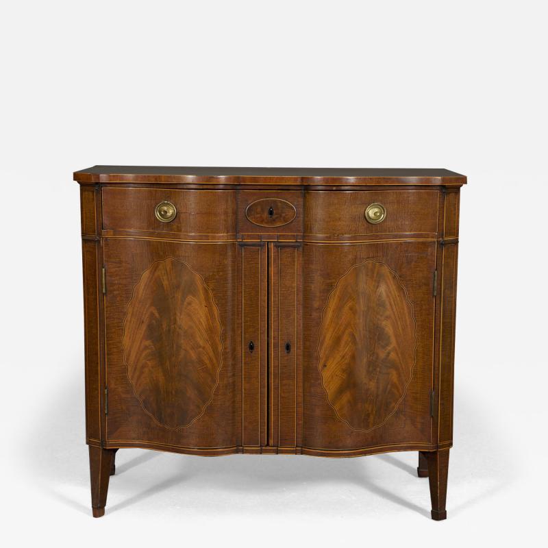 THOMAS SHEARER A SUPERB QUALITY FIDDLEBACK AND FLAME MAHOGANY TWO DOOR COMMODE