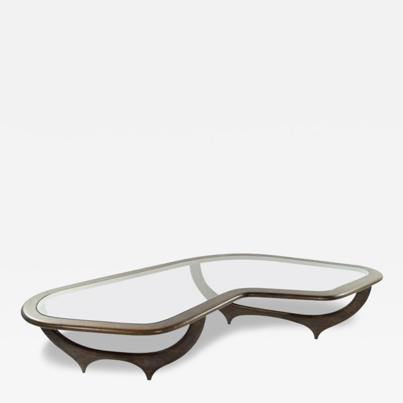 The Contour Coffee Table in Walnut by Stamford Modern