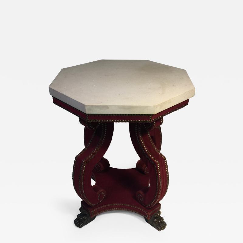 Thomas Messel Alidad Limited HADRIAN OCTAGONAL TABLE IN STUDDED RED VELVET WITH CLAW FEET