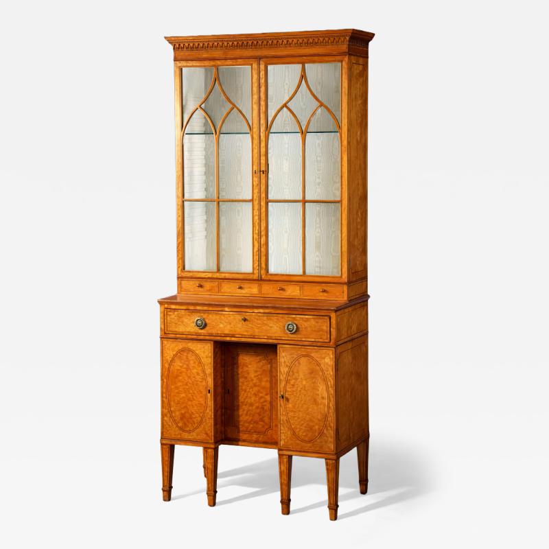 Thomas Sheraton A GEORGE III SATINWOOD SECRETAIRE CABINET ATTRIBUTED TO THOMAS SHERATON