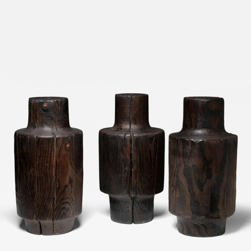 Three Burnished Solid Wood Sculptures