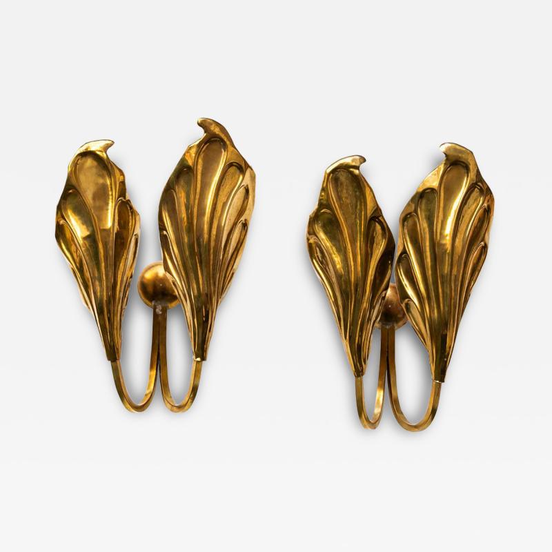 Tommaso Barbi Pair of Vintage brass shape leaf wall lights by Tommaso Barbi