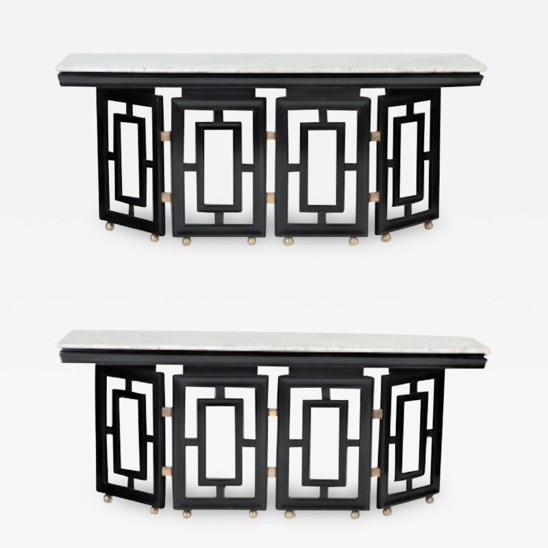 Tommi Parzinger A pair of Mid Century Modern ebonized marble top console tables circa 1950