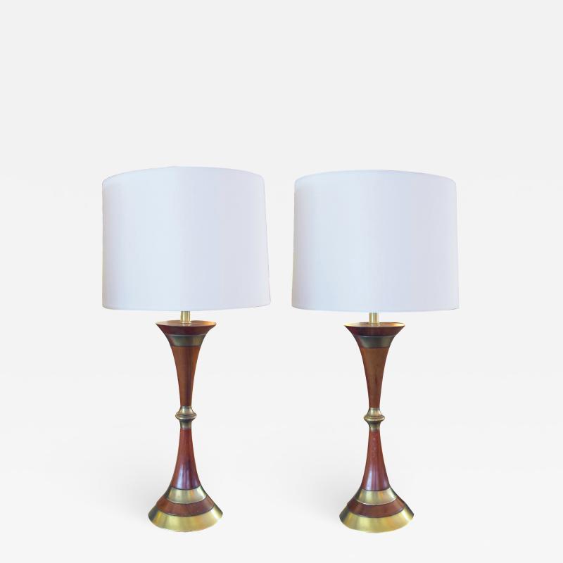 Tony Paul A Shapely Pair of American Mid century Walnut and Brass Hour glass shaped Lamps